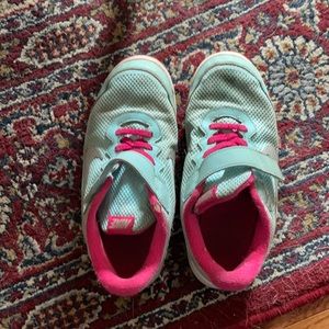 Well loved Nike Velcro slip on sneakers